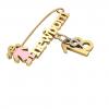 baby safety pin, girl – newborn – September 18th, made of 18k yellow gold vermeil on 925 sterling silver with pink enamel